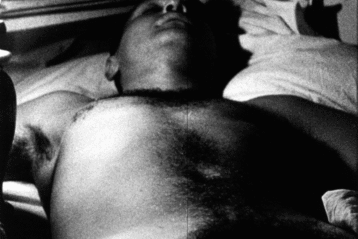 A sleeping John Giorno in Andy Warhol's multi-hour epic 